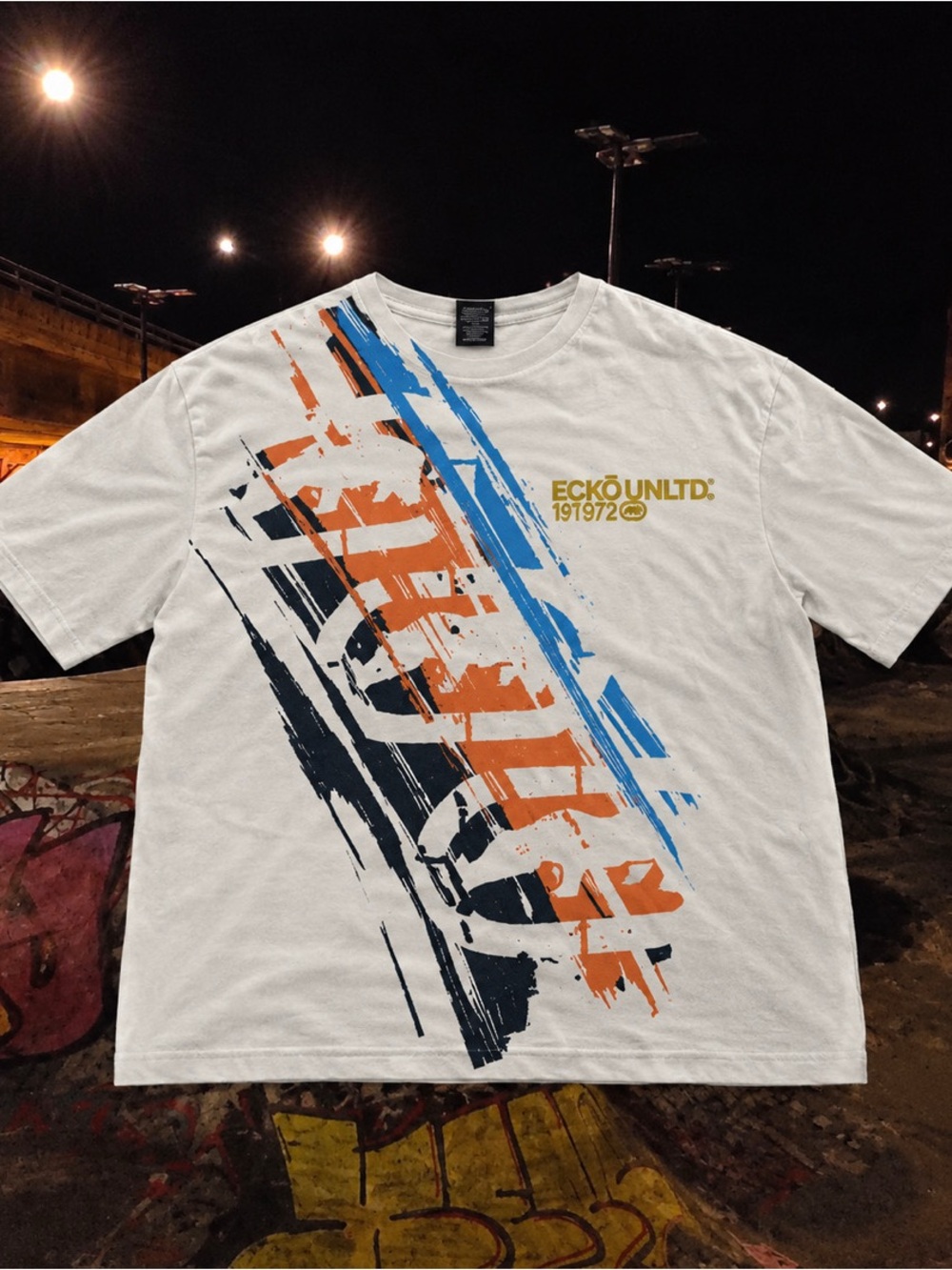 Ecko Unlimited White Short Sleeve Tee with Blue & Orange Graphic